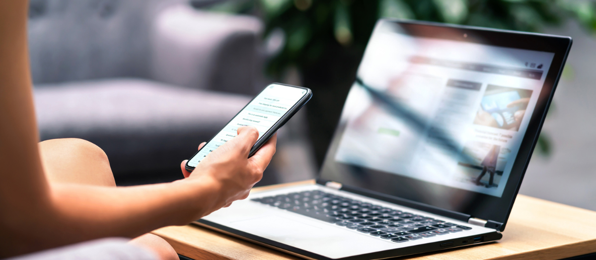 Phone and laptop to signify website. Featured image for 13 quick fixes to improve website blog